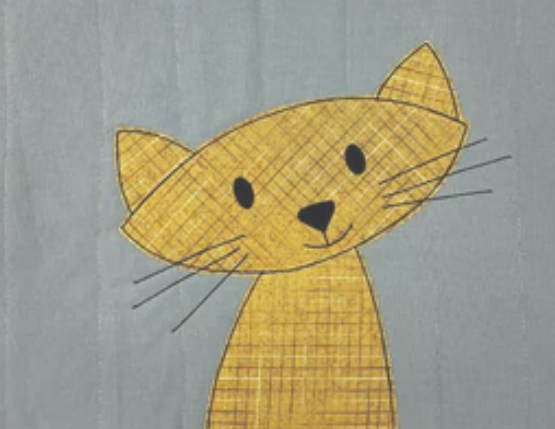 Close-up of an applique cat